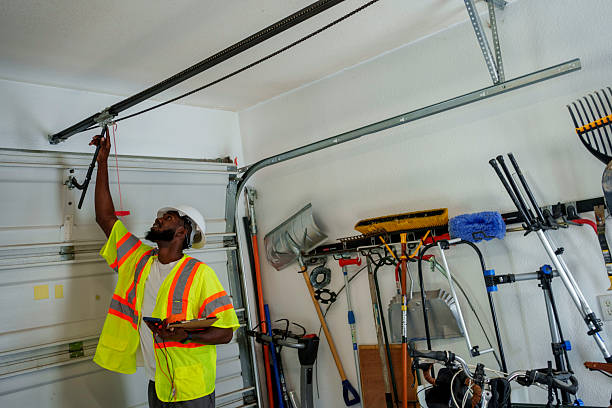 Professional Garage Door Panel Replacement technician working in Plum, PA